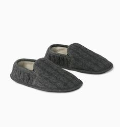 Raffinato, a meticulously crafted wool knit slipper, features an intricate cable knit design that exudes both elegance and warmth. Its blended lining, combining soft polyester and luxurious wool, ensures unparalleled comfort. Perfect for leisurely days spent indoors, this slipper envelops your feet in cozy luxury as you relax in the comfort of home. Wool Slippers With Cushioned Footbed For Winter, Winter Wool Slippers With Cushioned Footbed, Winter Wool Slip-on Slippers, Cozy Wool Slip-on Slippers, Cozy Wool Slippers For Winter, Wool Slippers With Leather Sole For Winter, Winter Wool Slippers With Rubber Sole, Winter Wool Slippers With Leather Sole, House Guest Gifts