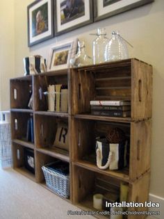 a wooden shelf filled with lots of books and other items on top of it's sides