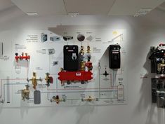 a wall with various electrical equipment on it