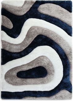 an area rug with wavy shapes in grey, white and blue colors on the floor