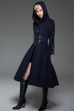 Navy wool coat, wool coat, minitary coat, winter coat, womens wool coat, long hooded coat, wool wint shirt, jacket, skirt, shoes, model, white model, runway, runway model, models, fashion, NYC, NYC fashion, designer, beauty, lifestyle, style, stylish, editorial, inspirational women, style icon, stylish women, portrait, powerful, powerful women. look of the day, chic basics, workwear, photo, photography, studio, heels, dots, dress, dresses, clothes, boots ,legs Navy Double-breasted Pea Coat For Winter, Hooded Wool Coat With Buttons For Fall, Winter Wool Long Coat With Button Cuffs, Hooded Pea Coat With Buttons For Workwear, Hooded Pea Coat For Workwear, Navy Peacoat With Button Cuffs For Fall, Military Style Peacoat For Workwear In Winter, Navy Double-breasted Pea Coat With Buttons, Military Long Coat With Buttons