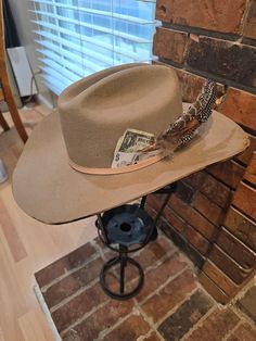 Custom Cattleman cowboy hat in 100% Australian wool. Classic cattleman crown shape with a straight crease down the middle. Brim is slightly upturned on the sides. Burned for a distressed look.   Stiff, structured material Crown size: 57 cm. Roomy fit. Adjustable sizing, hook-and-loop tab inside sweatband Brim: 4 in. Crown height: 4.5 in. One Size- One Size Shipping Get it within 3- 5 business days. Ships from United States Fitted Brimmed Rustic Fedora, Fitted Rustic Hat For Country Events, Rustic Top Hat With Flat Brim For Country Events, Rustic Fitted Felt Hat With Curved Brim, Rustic Fitted Fedora With Flat Brim, Rustic Fitted Fedora For Country Events, Rustic Brimmed Felt Hat, Fur Felt Hat Bands For Rodeo And Kentucky Derby, Western Fur Felt Top Hat With Flat Crown