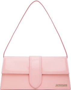 Patent leather top handle bag in pink. · Fixed carry handle · Logo hardware at face · Patch pocket at back face · Foldover flap · Patch pocket at interior · Twill lining · H5.25 x W11 x D2.5 in Part of the Le Chouchou collection. Supplier color: Pale pink Pink Jaquemus Bags, Modern Pink Satchel With Handle Drop, Pink Flap Bag With Detachable Double Handle, Pink Top Handle Flap Bag With Detachable Handle, Modern Pink Satchel Flap Bag, Formal Pink Flap Bag With Detachable Strap, Modern Pink Flap Shoulder Bag, Formal Pink Flap Bag With Detachable Handle, Pink Double Handle Flap Bag For Shopping