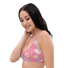 You will love this sweet pink desert flower bikini top! Extra lift provided by removable pads, it's super uncomplicated and easy to wear all day poolside, or even as a supportive layer under a UPF Long Sleeve. Supportive design for active beach days or poolside relaxation Made from sustainable recycled materials Mix and match with other pieces in the collection Provides freedom of movement Imported Size guide CHEST (inches) UNDERBUST (inches) XS 33 ⅛ 28 ¾ S 34 ⅝ 29 ½ M 36 ¼ 30 ¼ L 39 ⅜ 31 ⅞ XL 4 Summer Vacation Bra With Padded Cups, Pink Triangle Top Bra With Adjustable Straps, Pink Summer Swimwear With Removable Bra Pads, Pink Padded Swimwear For Summer, Pink Swimwear With Removable Bra Pads For Summer, Pink Padded Cup Swimwear For Summer, Pink Triangle Top Swimwear With Adjustable Straps, Vacation Beach Bra With Removable Pads, Pink Summer Swimwear With Adjustable Straps