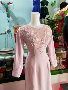 Ao dai dinh, silk and mesh fabric, Vietnamese traditional long dress, satin pants Provide you basic measurements and we promise an amazing fit. Different colored fabrics available Traditional Pink Ao Dai For Formal Occasions, Elegant Pink Ao Dai For Formal Occasions, Festive Pink Ao Dai For Formal Occasions, Elegant Silk Ao Dai For Party, Pink Fitted Elegant Ao Dai, Pink Elegant Fitted Ao Dai, Elegant Fitted Pink Ao Dai, Formal Pink Dress With Pearl Embroidery, Silk Ao Dai For Party