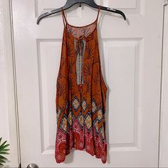 Women’s Halter Top Size Medium Bohemian/Hippy Vibes Color Is A Beautiful, Rich, Burnt Sienna String Tie Detail At Neck Light, Flowy, Breathable Material Never Worn - New Condition Smoke Free Home Bohemian Blouse With Vibrant Print For Beach, Beach Rayon Tops With Boho Print, Summer Red Boho Print Top, Beach Boho Print Rayon Tops, Summer Festival Blouse With Vibrant Print, Bohemian Sleeveless Printed Blouse, Patterned Sleeveless Bohemian Blouse, Sleeveless Bohemian Printed Blouse, Bohemian Sleeveless Patterned Blouse