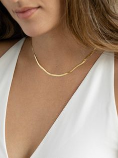 Your 2022 essential. Unique, cool, and luxurious - layer this beauty with everything. Details: * Gold KT: 14K Yellow. Real solid gold, made to last a lifetime. * Chain Length: 16 or 18 inches * Chain Style: Herringbone * Chain width: 3mm for the 14k * Secured with a lobster clasp * Ethically sourced materials from the USA * Handmade in Toronto * Ready to ship in 3-5 business days * Arrives in a beautiful package ready for gifting We love our customers - you're in good hands. * Happiness Guarante Gold Herringbone Necklace, We Love Our Customers, Herringbone Chain, Herringbone Necklace, Solid Gold Necklace, 14k Gold Necklace, Liquid Gold, Gold Piece, Jewelry Christmas