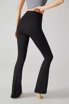 Lexi Black Flared Pant contains Lycra® elastane and conforms to your body shape. The flared trousers perfectly hide O-shaped and X-shaped legs, solve more leg shape troubles, and fully lengthen the leg lines. The simple version design can not only be worn out on the street, but also can be used as sports yoga pants. Come and choose a pair of soft and comfortable pants!  Full Length: Approx 105cm Materials: 81% Nylon, 19% Lycra® elastane Stretch Type: Very Stretchy Gentle Dry Clean Only Solid Flare High Stretch Leggings, Solid Flare High-stretch Leggings, Solid Color High Stretch Flare Leggings, Solid Color Flare Leggings With High Stretch, High Waist Black Elastane Flares, Stretch Flare Leggings In Elastane, Flare Leggings With 4-way Stretch, Flared Leggings With 4-way Stretch, High Stretch Wide Leg Yoga Pants