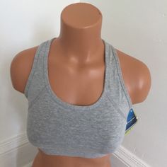 Champion Style # 6995 Woman Medium Support Sports Bra Brand New Never Used Guaranteed 100% Authentic Body = 79% Cotton , 9% Polyester 12% Spandex Mesh Insert = 84% Nylon , 16% Lycra/Spandex Liner = 90% Polyester , 10% Lycra ***Runs On The Small Side*** Basic Stretch Sports Bra, Comfortable Fitted Activewear For Light Exercise, Fitted Gray Sports Bra, Fitted Gray Activewear For Light Sports, Sporty Fitted Sports Bra With Go-dry Technology, Basic Fitted Activewear With Light Support, Light Support Casual Sports Bra, Casual Light Support Fitted Sports Bra, Casual Fitted Sports Bra With Light Support