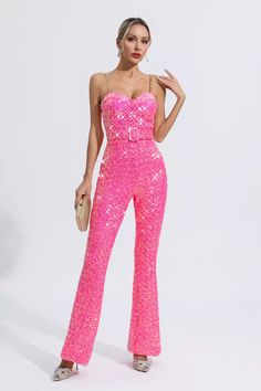 The Fallon Rose Red Sequins Jumpsuit blends fashion with sensuality. This stunning piece features a low-cut, off-shoulder bodice adorned with eye-catching rose red sequins. Perfect for special occasions or a night out, this garment is a must-have for those seeking a head-turning ensemble.  Length: Approx 131cm Materials: Polyester  Gentle Dry Clean Only  Model is 5 ft 7 and wears size S  Colour may vary due to lighting on images. The product images (without model) are closest to the true colour Red Sequin Jumpsuit, Sequins Jumpsuit, Silver Sequin Top, Glitter Wedding Dress, Sequin Jumpsuit, Black Off Shoulder, Bandage Midi Dress, Floral Shirt Dress, Red Sequin