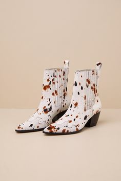 The Matisse Collins White Multi Speckle Calf Hair Leather Ankle Boots were made for walking with stylish confidence! Sleek, genuine calf hair leather (with a tan and black speckled cow-like print) shapes these pointed-toe boots that feature Western-inspired seaming. Elastic gusset panels accent the instep and outstep of the ankle-high shaft, while a pull tab at the back completes the slip-on silhouette. A classic stacked block heel lends the perfect cowgirl finish. 2. 5" stacked block heel. Ligh Leopard Print Leather Pointed Toe Boots, Leopard Print Leather Boots With Pointed Toe, Leopard Print Pointed Toe Leather Boots, Leopard Print Leather Ankle Boots, Calf Hair Boots With Round Toe For Fall, White Suede Boots For Fall, Leopard Print Leather Boots For Spring, Trendy Leopard Print Leather Boots, Chic Leopard Print Leather Boots