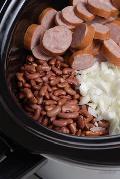 the food is being cooked in the slow cooker