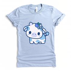 PLEASE NOTE: This is a UNISEX t-shirt. So ladies if you are looking for a tighter fit then consider ordering down a size. If you are looking for a more oversized fit then consider ordering up a size. This cute kawaii blueberry cow tshirt will look great on you! Great gift to give to your friends as well. These t-shirts have-ribbed knit collars to bolster shaping. The shoulders have taping for better fit over time. Dual side seams hold the garment's shape for longer. .: 100% Airlume combed and ri Kawaii Cute Crew Neck Tops, Cute Kawaii Crew Neck Top, Kawaii Blue Tops For Summer, Kawaii Crew Neck Top With Cute Design, Blue Kawaii Summer Tops, Blue Kawaii Tops For Summer, Blue Harajuku Cotton Tops, Blue Kawaii Top For Summer, Harajuku Blue Crew Neck Top