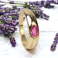 Vintage Ruby Wide Band Ring, Wedding Ring, 14k Solid Gold, Anniversary Gift, Unisex Ring, July Birthstone, Promise Ring, Simple Wedding Band Ring Description:- Main Stone- Ruby Cut of Stones - Faceted  Stone size - 4x6 mm Stone Color- Pink Stone Shape - Oval Creation- Lab Created Birthstone - July Stone Grade - AAA+ Check out my other items!   PAYMENTS   We accept PayPal, If we do not receive payments immediately we will hold the item only for one working day for your payments and we will be re- Yellow Gold Hallmarked Ruby Ring For Wedding, Hallmarked Yellow Gold Ruby Ring For Wedding, Classic Wedding Signet Ring With Birthstone, Anniversary Ruby Ring With Center Stone In Round Band, Ruby Anniversary Ring With Center Stone, Yellow Gold Signet Ring With Gemstone For Wedding, Wedding Solitaire Signet Ring, Ruby Ring With Round Band For Anniversary, Wedding Ruby Birthstone Ring Stamped 14k