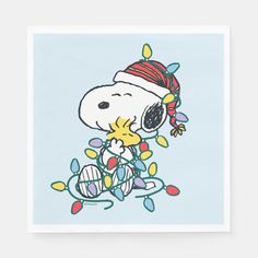 a snoopy christmas card with a cartoon character on it