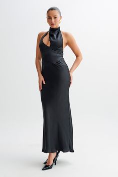 Unmatched beauty.The BELLADONNA Satin Halter Maxi Dress is an exquisite choice for elegant evenings and special occasions. This dress features a chic halter neckline with a front bust cutout that adds a touch of allure. The straight skirt flows gracefully to the floor, complementing the open back design for a striking silhouette. Fully lined for comfort, the dress also includes a centre back invisible zip for a seamless finish. With its sophisticated style and luxurious satin fabric, the Bellado Fitted Halter Dress With Keyhole Back For Evening, Evening Satin High Neck Maxi Dress, Fitted Halter Neck Dress For Gala, Fitted Bodice Halter Dress For Prom Party, Fitted Bodice Halter Dress For Prom Season Parties, Halter Dress With Fitted Bodice For Prom Season Party, Fitted Bodice Halter Dress For Prom Season, High Neck Satin Evening Dress, Glamorous Halter Dress With Back Opening For Prom