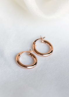 Minimalist Rose Gold Hoops in 18k rose gold vermeil DETAILS * Material: 18k Rose Gold Vermeil Nickel Free * Handmade in our sunny Houston studio What is Gold Vermeil? - The thickness of gold coating in vermeil jewelry is much more substantial than the flash or regular gold-plated jewelry, ensuring deeper long-lasting color and excellent durability. Today, vermeil is the choice of most fashion-savvy women for its unique balance of cost and quality. Also, our gold vermeil is nickel-free and is saf Classic Hypoallergenic Rose Gold Hoop Earrings, Rose Gold Sterling Silver Hoop Earrings With Polished Finish, Rose Gold Polished Sterling Silver Hoop Earrings, Rose Gold Small Hoop Hypoallergenic Earrings, Classic Rose Gold Hypoallergenic Huggie Earrings, Classic Hypoallergenic Rose Gold Huggie Earrings, Hypoallergenic Rose Gold Round Huggie Earrings, Classic Rose Gold Earrings With Shiny Finish, Classic Shiny Finish Rose Gold Earrings