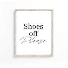 a black and white poster with the words shoes off please in cursive writing