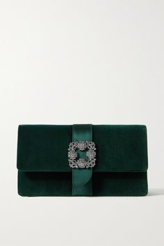 Manolo Blahnik's 'Capri' clutch is the perfect finishing touch for evening looks. Made from plush velvet, it has smooth satin trims and a shimmering crystal-embellished buckle. The compact interior includes a slip pocket for your cards or cash, while the slim strap allows you to go hands-free. Manolo Blahnik Clutch, Ladies Purses Handbags, Hand Bags Ideas, Green Clutches, Bags Ideas, Embellished Clutch, Velvet Clutch, Handbags Fashion, Beautiful Ladies