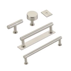 an assortment of handles and knobs on a white background