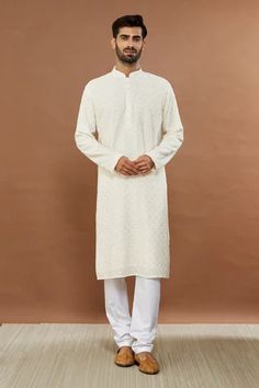 Shop for Aham-Vayam Cream Cotton Mayur Embroidered Kurta And Churidar Set for Men Online at Aza Fashions Festive Churidar With Chikankari Embroidery For Eid, Festive Straight Kurta With Resham Embroidery, Cotton Kurta With Self Design For Wedding, Cotton Self Design Kurta For Wedding, Diwali Cotton Silk Kurta With Chikankari Embroidery, Traditional Cotton Sherwani With Self Design, Cotton Wedding Kurta With Self Design, Festive Unstitched Chikankari Embroidery Kurta, Festive Cotton Silk Churidar With Chikankari Embroidery