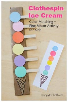 an ice cream craft made with popsicles and colored paper