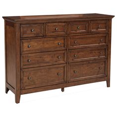 a large wooden dresser with many drawers