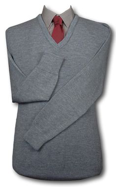 "A top quality, plain, mid grey 'V' neck jersey with straight cuffs. Available in sizes from 36\" to 48\". 50% WOOL and 50% man made fibres. Fully machine washable. Medium weight and will keep you nice and warm. British made. A range of matching accessories are also available." Classic Gray Sweater With Ribbed Cuffs, Classic Gray Sweater For Workwear, Classic Heather Grey Tops For Fall, Classic Heather Grey Fall Tops, Classic Heather Grey Fall Top, Fitted Gray Sweater With Ribbed Cuffs, Classic Fitted Solid V-neck Sweater, Classic Gray Winter Tops, Classic Solid V-neck Long Sleeve Sweater