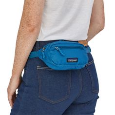 evo.com | Patagonia Fanny Packs > The Patagonia Ultralight Black Hole | Patagonia Ultralight Black Hole Bag in Blue Patagonia Bum Bag, Patagonia Waist Pack, Patagonia Black Hole, Hip Pack, Webbing Belt, Water Repellent Fabric, Black Hole, Fanny Pack, Patagonia