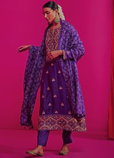 Features a Zari embroidered straight kurta with embroidered booties and a heavy yoke, Teamed with elegant straight pants and a geometrical bandhani silk dupatta. Composition : Kurta and Pants - Silk Chanderi, Dupatta- Silk Care: Dry Clean Only and Vacuum Storage This product can be customised for sleeves, length of blouse and neckline Delivery : 4-6 weeks as the product is hand crafted. For more information and sizes please contact fabiliciousfashion@gmail.com or visit our Copenhagen studio.Abou Luxury Bollywood Bandhani Print Dupatta, Luxury Festive Bandhani Print Dupatta, Chanderi Silk Suits, Bandhani Dupatta, Chanderi Dupatta, Kurta Set For Women, Pink City, Vacuum Storage, Wedding Saree Indian