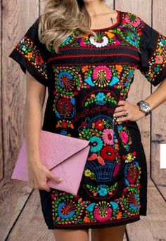 This Beautiful Floral embroidered Dress is the perfect dress to add to your wardrobe. -Its cute enough to dress up for a party or even just wear it to a picnic. -It is handmade and hand embroidered with love by Mexican Artisans in Puebla, Mexico. Embroidered Mexican Dress, Multicolor Mini Dress With Floral Embroidery, Embroidered Cotton Mini Dresses, Fitted Mini Dress With Multicolor Embroidery, Casual Dress With Multicolor Embroidery And Embroidered Hem, Fitted Dresses With Multicolor Geometric Embroidery, Casual Dress With Multicolor Embroidered Hem, Spring Embroidered Dress With Multicolor Machine Embroidery, Multicolor Embroidery Short Sleeve Party Dresses