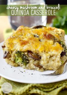 a close up of a plate of food with broccoli and cheese on it