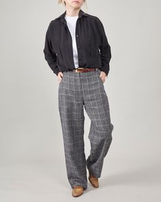 Fall in love with these handmade chic and baggy women's slacks, crafted from lightweight wool fabric perfect for the warmer days of transitional seasons. The striking large plaid pattern enhances their textured charm.  Designed with a mid-waist and a loose, straight cut, these pants blend elegance with comfort. They feature front pockets and back welt pockets, contributing to a minimalist, masculine-inspired look. Ideal for elevating everyday outfits, they add a unique touch to your urban chic s Casual Tapered Leg Pants For Tailoring, Casual Wool Bottoms With Relaxed Fit, Relaxed Fit Wool Pants For Fall, Casual Wool High-waisted Pants, Baggy Classic Wide Leg Workwear Pants, Classic Baggy Wide Leg Work Pants, Classic Baggy Wide Leg Pants For Work, Casual Wool Straight Leg Pants, Casual Straight Leg Wool Pants