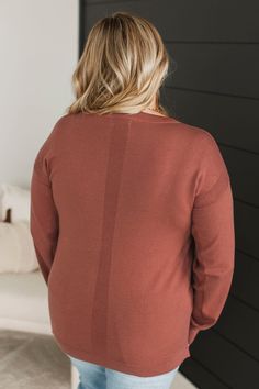 Fit & Details: True to size with great stretch. Soft, lightweight knit material Crew neckline Ribbed knit detailing along hems Small side slits Measurements: X-Small: Bust 38" Length 25" Small: Bust 40“ Length 25.5“ Medium: Bust 42“ Length 26“ Large: Bust 44“ Length 26.5“ X-Large: Bust 46“ Length 27“ Fabric & Material Care: Machine wash cold on delicate. Lay flat to dry. 55% Viscose, 45% Nylon. *Imported* Model Info: Leah is modeling a large. Mack is modeling an x-small. Football Graphic Tee, Dolman Sweater, Model Profiles, Fit Details, Babydoll Top, Plaid Jacket, Large Bust, Lightweight Knit, Knitting Materials