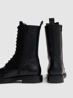 35mm Heel. Leather upper. Front lace-up closure. Leather lining and insole. Leather sole Leather Combat Boots, Versace Brand, Ski Accessories, Loafer Mules, Ann Demeulemeester, Sports Accessories, Flat Espadrilles, Swim Accessories, Heeled Loafers