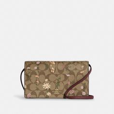 Anna Foldover Clutch Crossbody In Signature Canvas With Wildflower Print | COACH® Foldover Clutch, Adidas Adilette, Coach Outlet, Coach Gifts, Signature Canvas, Crossbody Clutch, Cute Bags, Matte Gold, Smooth Leather