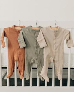 These are our new ribbed footed baby pajamas. They are made out of a ribbed fabric and are done up with snaps. Wash in cold water 95% cotton 5% spandex Minimal Baby, Clothes Stores, Storing Baby Clothes, Boho Baby Clothes, Fashionable Baby, Baby Boy Clothing, Baby Club, Neutral Baby Clothes, Baby Sleepers