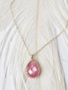 "Get Extra 5% off when you put your item in their cart! CODE: \"MOTHERDAYDEALS\" Pink Sapphire Teardrop Necklace/ Pear Shaped Pink Zircon Pendant/ Faceted Pink Sapphire Necklace/ Everyday Necklace/ Birthday Gift This beautiful, classic solitaire 10 x6mm pear shaped stone is the epitome of understated elegance. The wearer of this exquisite piece is sure to be the envy of everyone in the room with this sparkling pendant that can be worn everyday. Features * Made to Order *Gold KT: 14K Solid Gold * Pink Pear-shaped Gemstone Necklace, Elegant Pear-shaped Necklace For Gift, Teardrop Jeweled Necklace Gift, Jeweled Teardrop Necklace As Gift, Elegant Briolette Gemstone Drop Necklace, Fine Jewelry Pink Teardrop Pendant, Elegant Teardrop Gemstone Necklaces, Pink Teardrop Pendant Fine Jewelry, Elegant Gemstone Drop Necklace For Anniversary