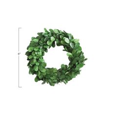 a green wreath is shown with measurements for the size and shape in front of it