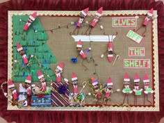 a bulletin board decorated with elf hats and candy canes for the elves in the shelf