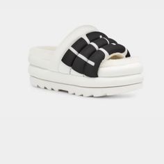 Ugg Women's Maxi Slide Logo Sandal Synthetic Platform Slippers With Rubber Sole For Spring, Spring Synthetic Slides With Round Toe, White Platform Casual Flip Flops, Synthetic Sandals With Round Toe For Outings, White Casual Platform Flip Flops, Trendy Closed Toe Synthetic Slides, Casual White Platform Flip Flops, Casual White Leather Platform Slippers, White Synthetic Slide Platform Slippers