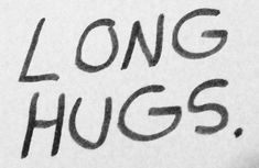 the words long hugs written on a piece of paper