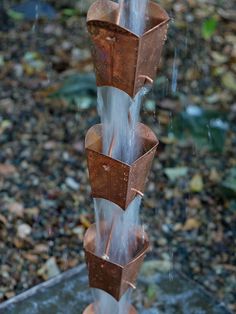 a fountain spewing water from it's sides