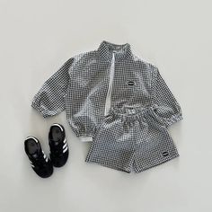 Looking for a cool and comfy outfit for your little adventurer? 😎 This Plaid Jacket and Shorts Set is the perfect pick for summer fun! ☀️ Made from breathable cotton, this set features a classic plaid jacket and matching shorts that are both stylish and comfortable. The long sleeves on the jacket offer a bit of sun protection, while the shorts keep your little one cool on hot days. Whether they're exploring the park, playing at the beach, or just hanging out with friends, this set is sure to become their go-to outfit for the season. #summerfashion #kidsclothes #plaidjacket Specifications: Age Range: 1-6 years Season: Summer Material: Cotton Pattern Type: Plaid Gender: Unisex Item Type: Set Department Name: Children Closure Type: Single Breasted Sleeve Style: Regular Sleeve Length: Long Fi Casual Cotton Gingham Sets, Casual Gingham Cotton Sets, Sporty Cotton Sets With Pockets, Sporty Cotton Set With Pockets, Casual Gingham Sets For Spring, Casual Playwear Sets With Pockets, Casual Spring Gingham Sets, Sporty Cotton School Sets, Playing At The Beach