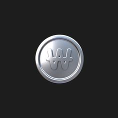 a metal button with the letter w in it's center on a black background