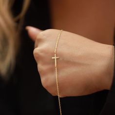 This beautiful, dainty cross bracelet is the perfect gift for a special women or young girl celebrating her first communion. Crafted from brilliant gold, this piece of cross jewelry will remind her of her each time she wears it. Can you imagine her joy when she opens the gift? Please note that we also offer matching Cross Pendant Necklace in our shop! Elegant Gold Jewelry For Confirmation, Adjustable Cross Rosary Bracelet As Gift, Dainty Yellow Gold Rosary Bracelet As Gift, Elegant Cross Rosary Bracelet As Gift, Dainty 14k Gold Jewelry For Baptism, Elegant Cross Jewelry For First Communion, Elegant Rosary Bracelet With Cross For Gift, Adjustable Chain Cross Rosary Bracelet As Gift, Minimalist Cross Jewelry For First Communion