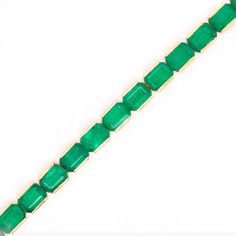 18K Gold Brazilian Emerald Tennis Bracelet-

With its timeless design and irreplaceable collection of high-quality emeralds, this bracelet exudes elegance and class.  Perfect for daily wear, this bracelet promises lasting memories and a perpetual sparkle. Emerald Cut Green Tennis Bracelet For Formal Events, Emerald-cut Green Tennis Bracelet For Formal Occasions, Formal Green Emerald Cut Tennis Bracelet, Classic Emerald-cut Emerald Bracelet, Formal Green Emerald-cut Tennis Bracelet, Luxury Green Rectangular Bracelets, Green Octagonal Faceted Jewelry, Green Emerald Tennis Bracelet With Gemstones, Green Emerald Gemstone Tennis Bracelet