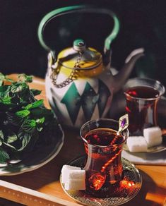 tea and marshmallows sit on a tray