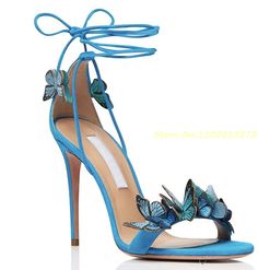 Cross-tied Sandals For Party In Spring, Summer Party Lace-up Ankle Wrap Sandals, Green Lace-up Sandals For Spring Beach Outings, Blue Strappy Sandals For Spring, Cross-tied Sandals For Spring Party, Summer Party Sandals With Ankle Tie, Summer Party Lace-up Sandals With Ankle Tie, Spring Party Ankle Tie Lace-up Sandals, Blue Strappy Sandals For Summer