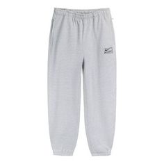 Nike x Stussy Crossover Solid Color Logo Alphabet Embroidered Bundle Feet Athleisure Casual Sports Pants Asia Edition Unisex Gray DJ9491-063 Stussy Nike Joggers, Nike Stussy Sweatpants, Nike X Stussy Joggers, Stussy Tracksuit, Stussy Sweatpants, Stussy Joggers, Stussy Pants, Sweat Pants Men, Nike X Stussy